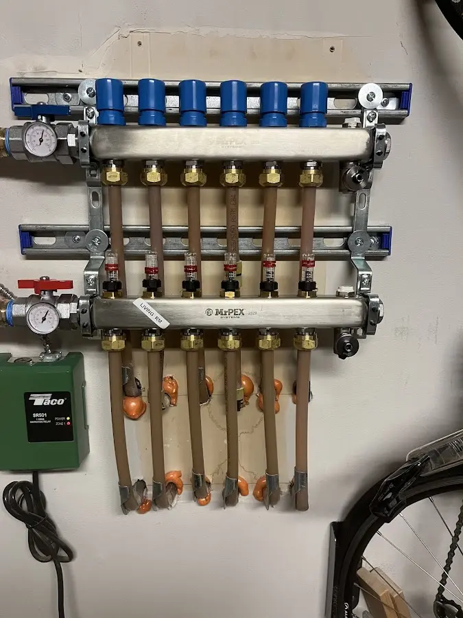 Plumber performing Gas Line Installation at a residential property in Lolo